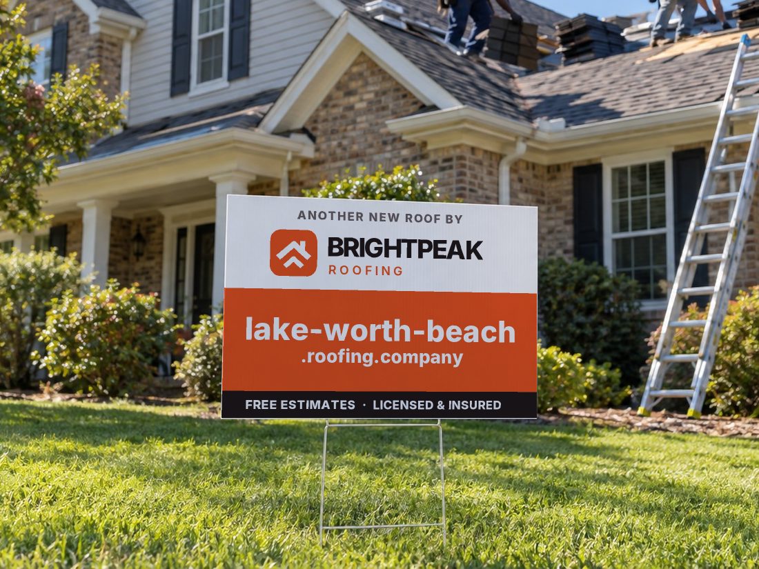 lake-worth-beach.roofing.company on a yard sign in front of a house getting a new roof